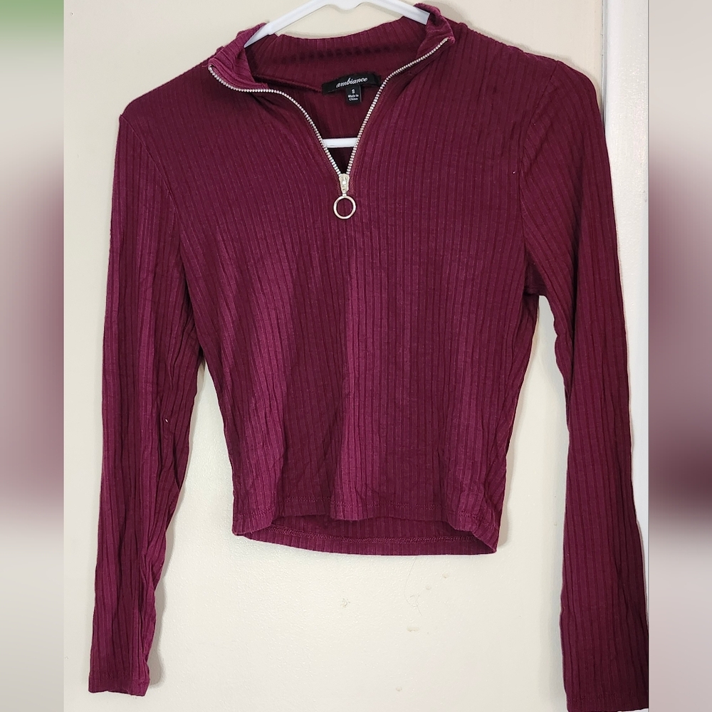 Red long sleeve top with zipper at front